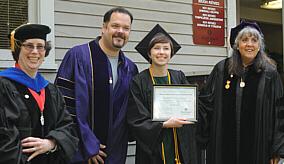 Graduate receiving award